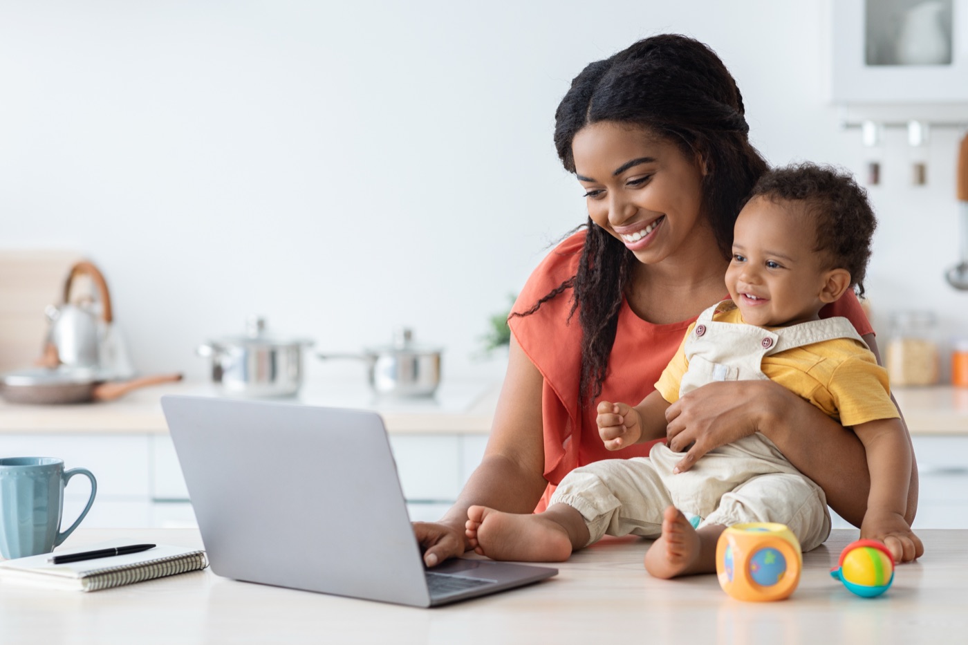 A mother taking part in a study from home with her baby