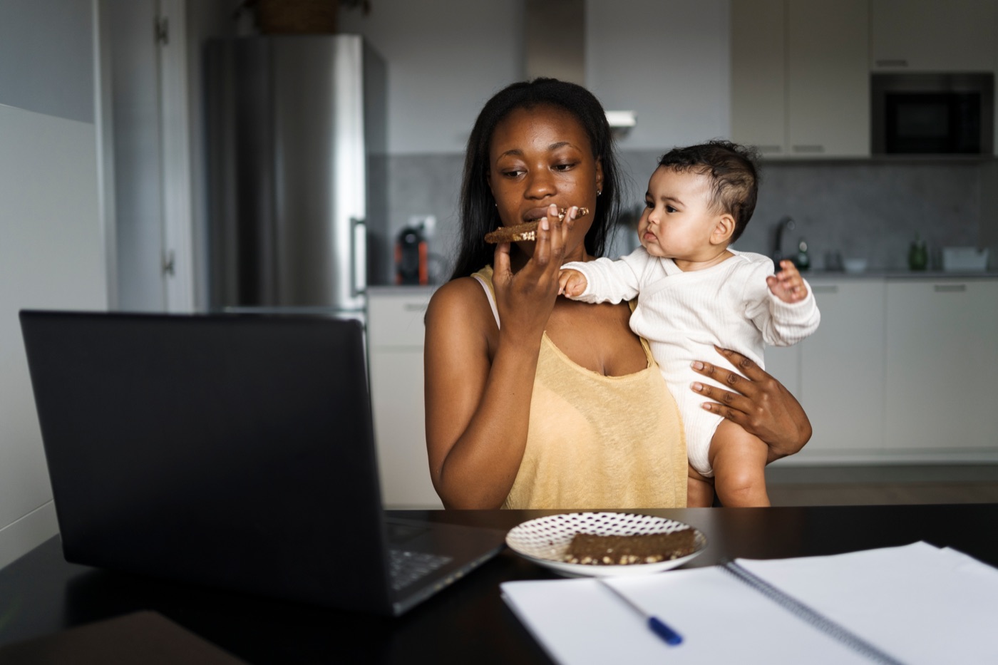 A participant at home with her child