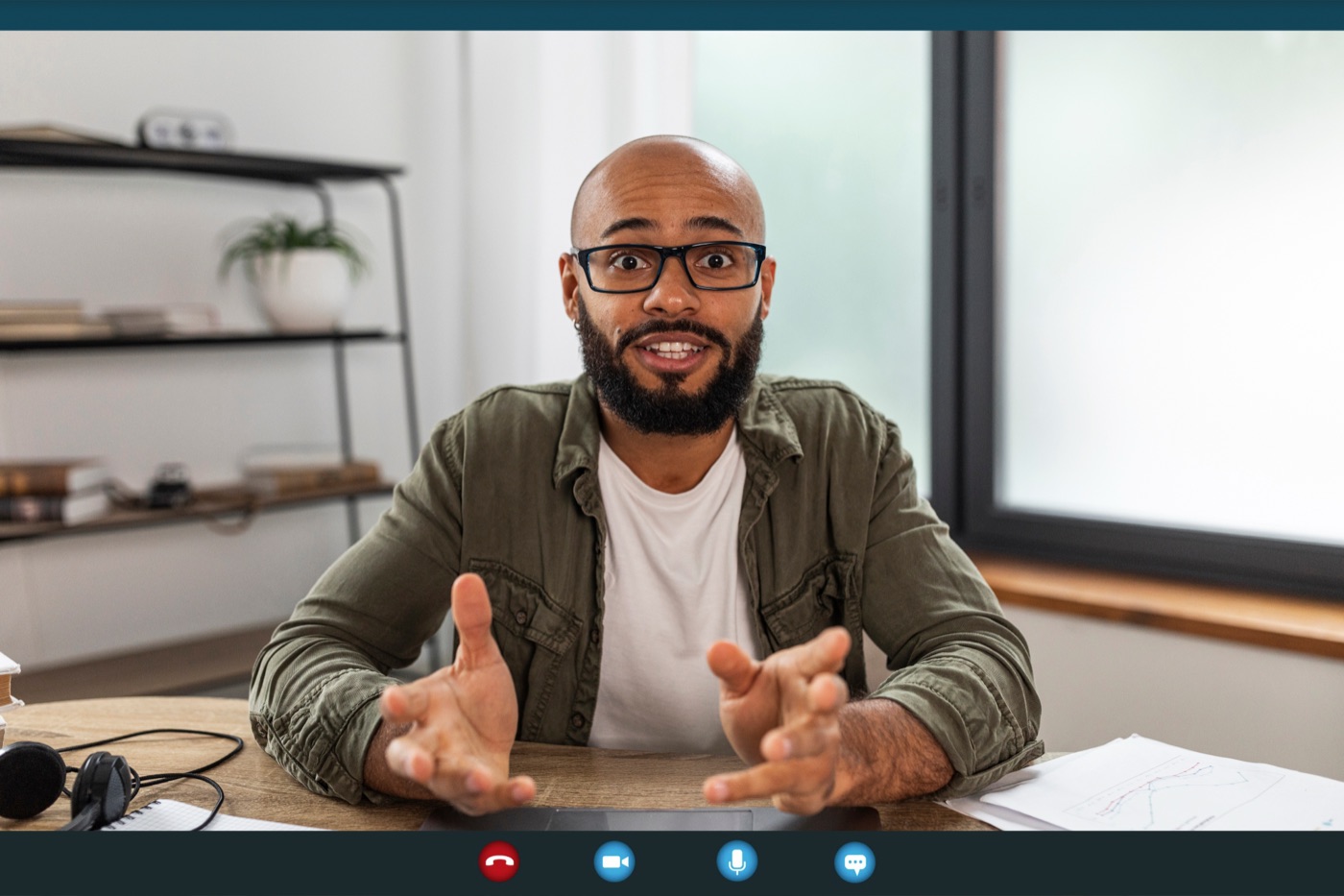 A researcher talking to a participant on a video call